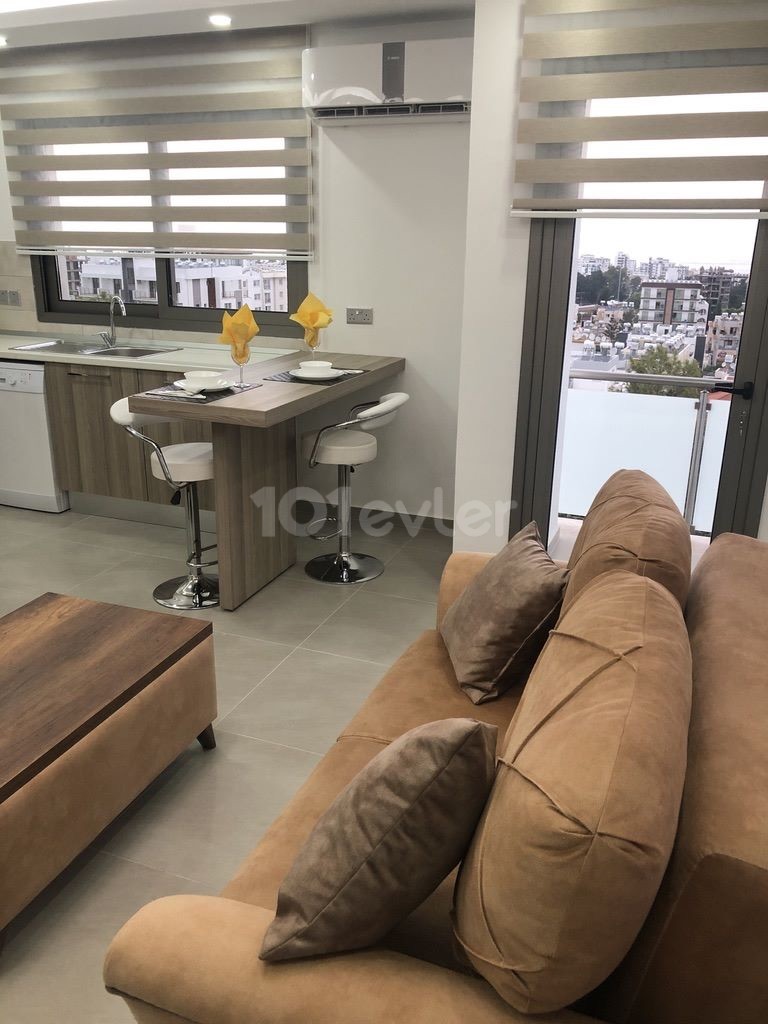 GİRNE MERKEZ BÖLGESİNDE  EŞYALI 1+1  DAİRE