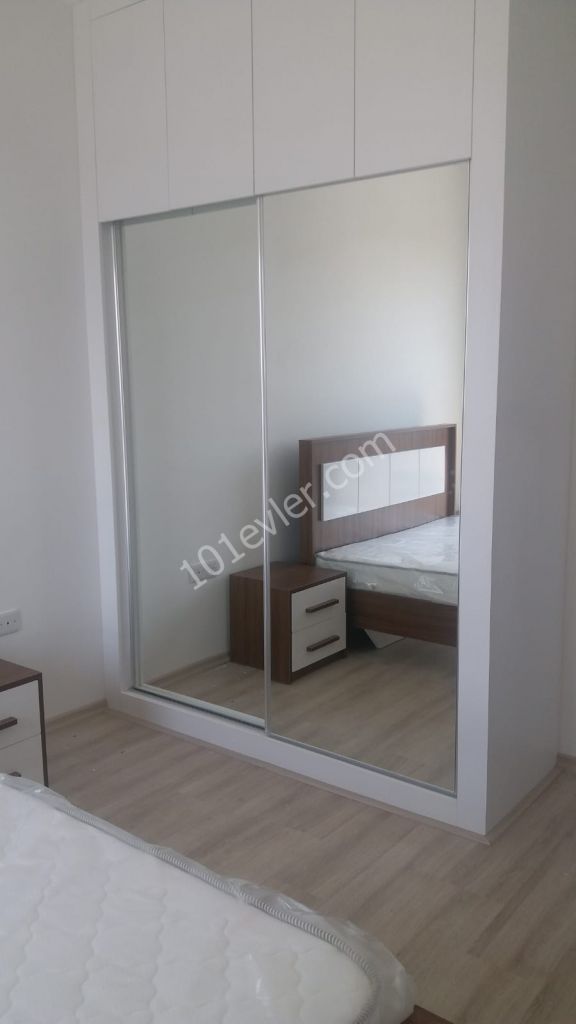 gazimağusa üniversitenin yanında yeni lüks binada  kiralık 1+1 daire 