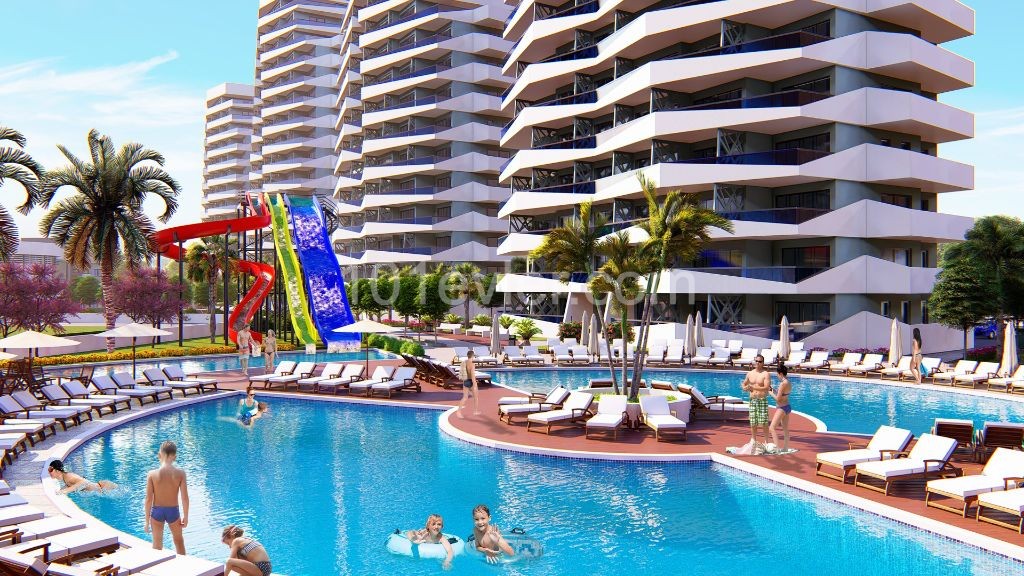 Enjoy a 4-season Holiday in Iskele Longbeach District,1+0 Apartments for Sale Habibe Cetin 05338547005 ** 