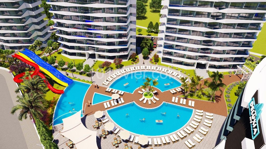 Enjoy a 4-season Holiday in Iskele Longbeach District,1+1 Apartments for Sale Habibe Cetin 05338547005 ** 