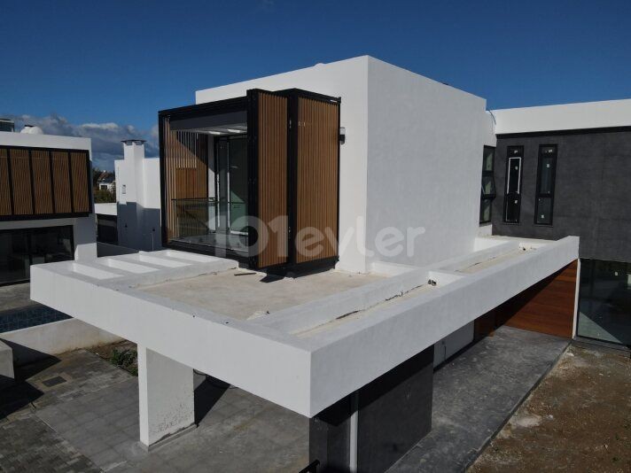 Located in Edremit,Centaurea: Luxury modern villa with 4 ensuite bedrooms and private swimming pool