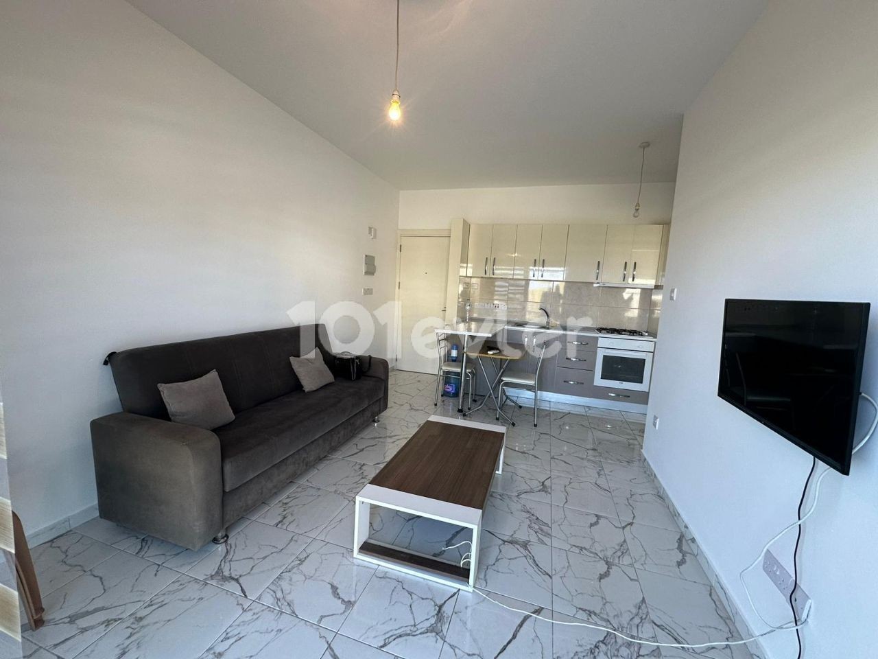 KARAOĞLANOĞLU GARDEN FLOOR 1+1 FLAT FOR RENT