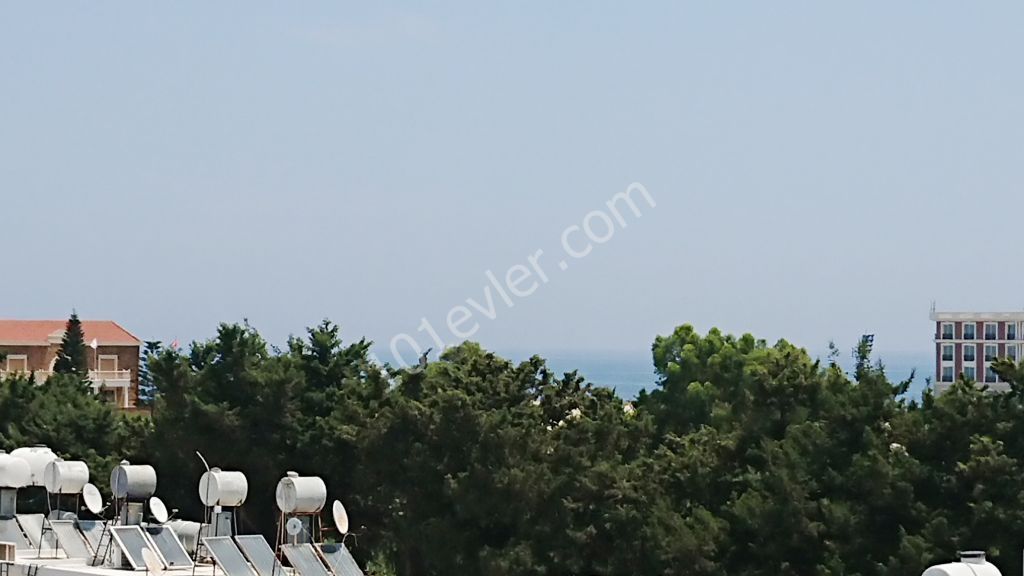 Karaoğlanoğlu Kervansaray Bölgesi Anayola,  Plaja,  Merit Park Hotel ve Euro Casino’ya Yürüme Mesafesinde Dağ & Deniz Manzaralı SATILIK 2+1 Daire