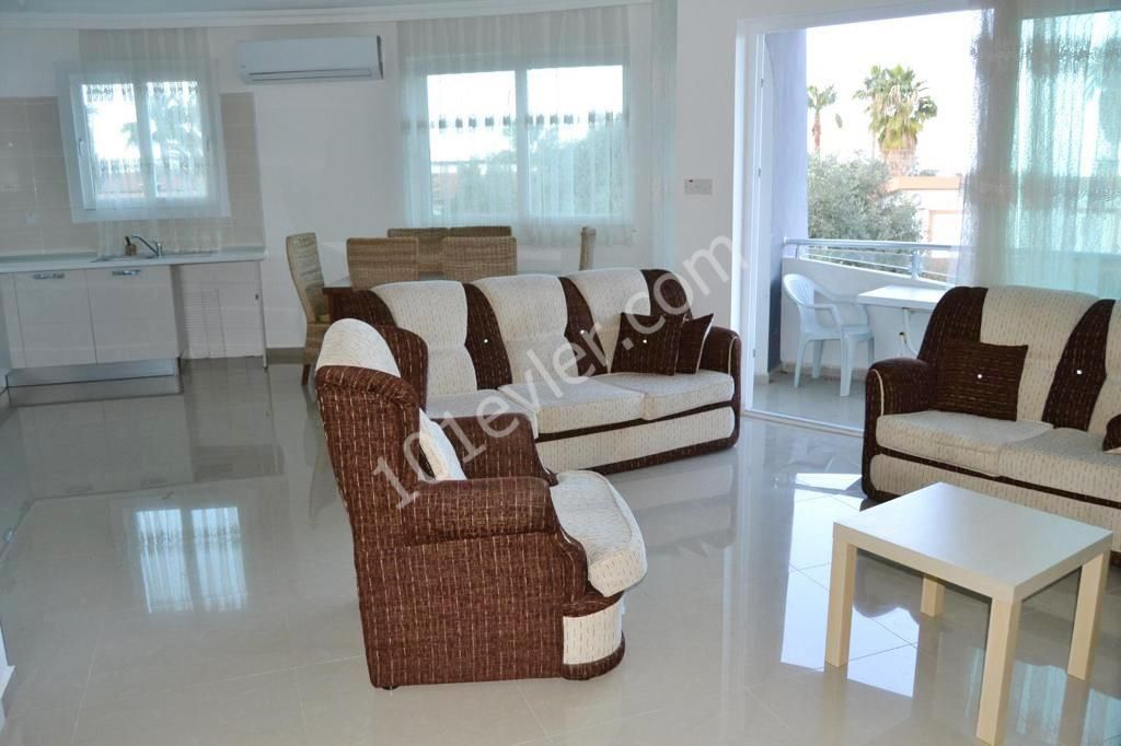 An APARTMENT FOR SALE with A Rental Income of 2 + 1 on a Site with a Shared Pool in Karaoglanoglu S District! ** 