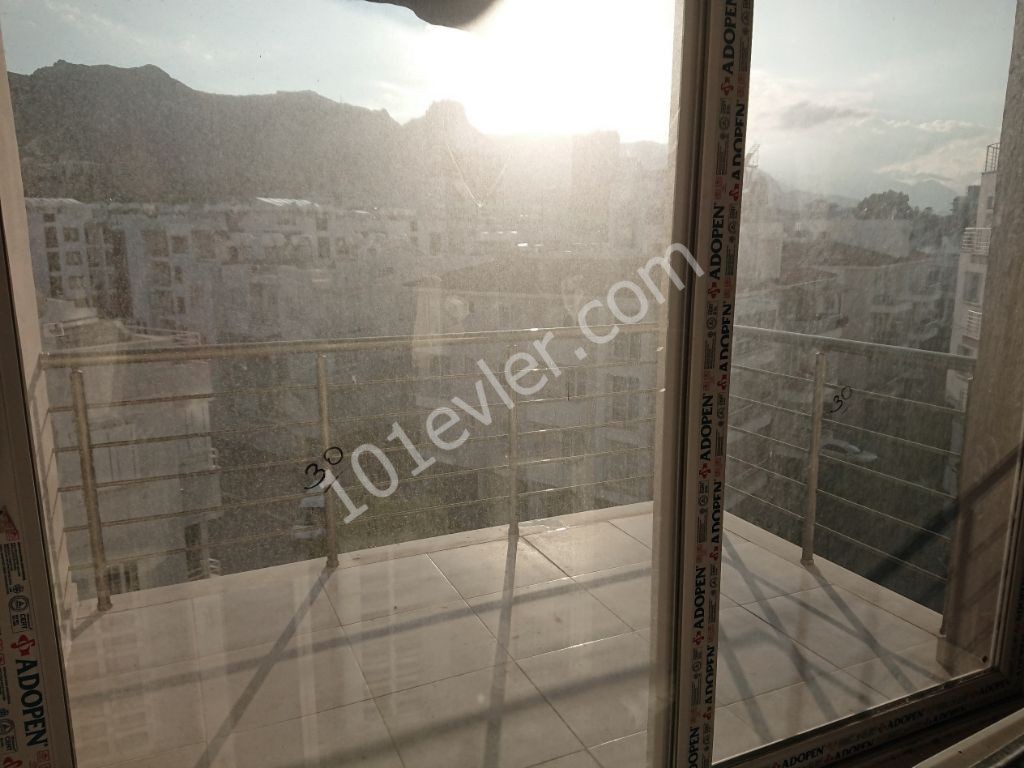 A Spacious 3 + 1 Apartment for Rent with a view of the Mountains and the Sea in a New Elevator Building in the Center of Kyrenia! **  ** 