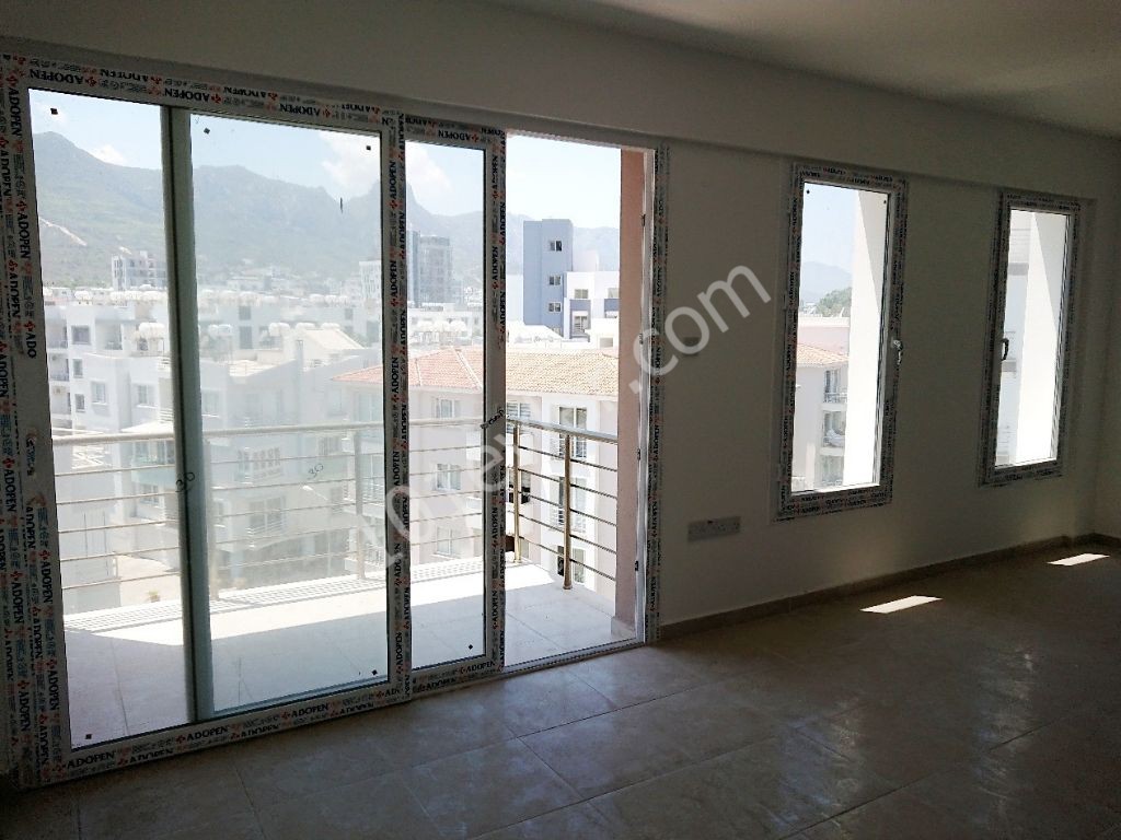 A Spacious 3 + 1 Apartment for Rent with a view of the Mountains and the Sea in a New Elevator Building in the Center of Kyrenia! **  ** 