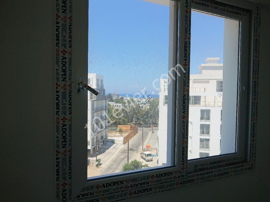 A Spacious 3 + 1 Apartment for Rent with a view of the Mountains and the Sea in a New Elevator Building in the Center of Kyrenia! **  ** 