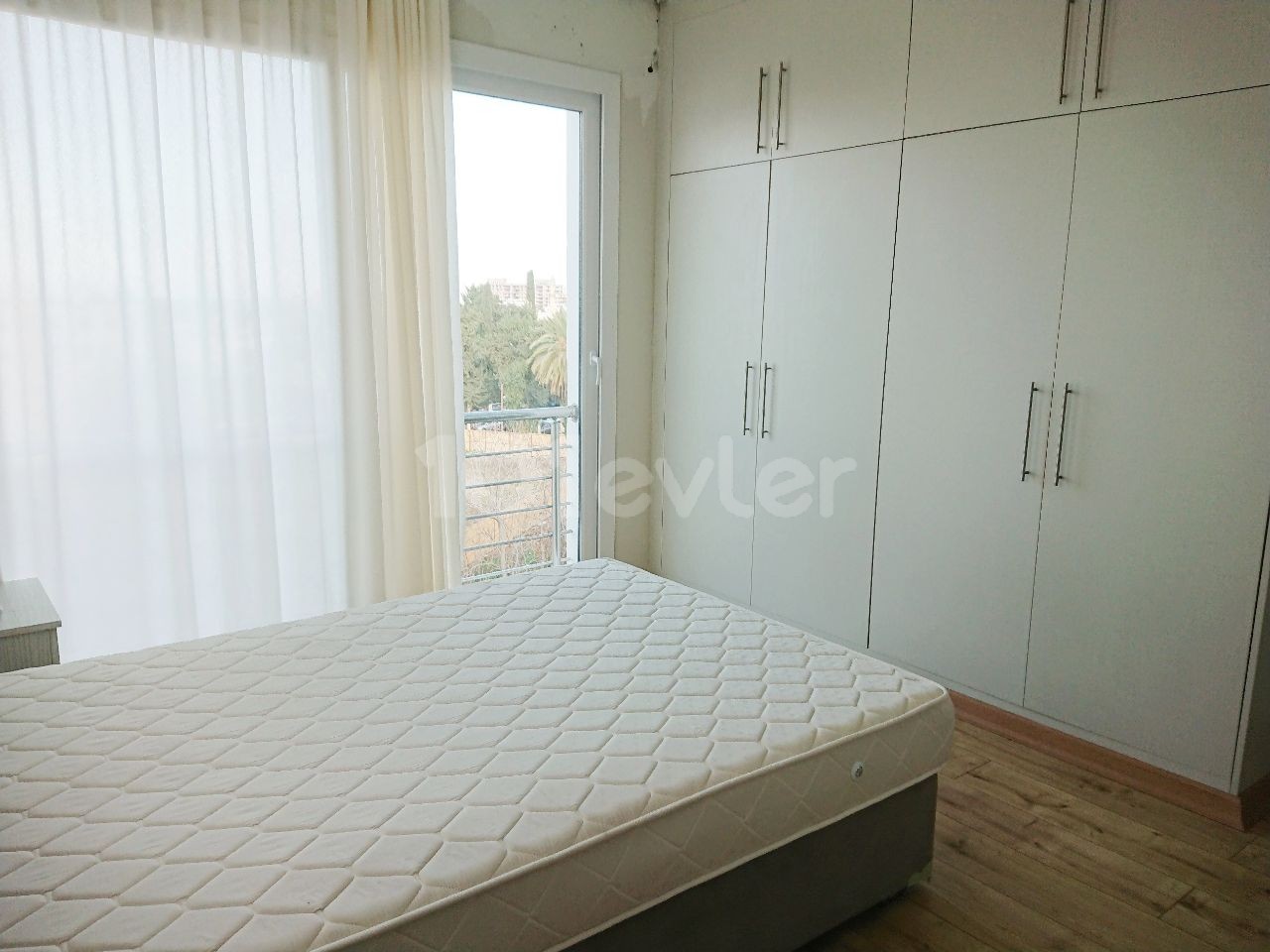 A Spacious 2 + 1 Apartment for SALE with Sea Views in A Quality Elevator Building in the Center of Kyrenia! **  ** 