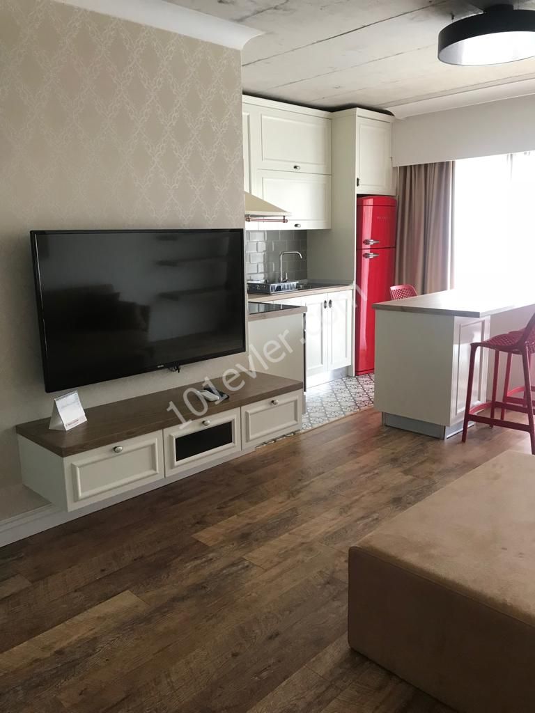 Girne Merkez'de Ultra  Lux Full Eşyalı 1+1 Kiralık Daire ( Daire İçi ve Apartman Temizliği Aidatı  Dahil)