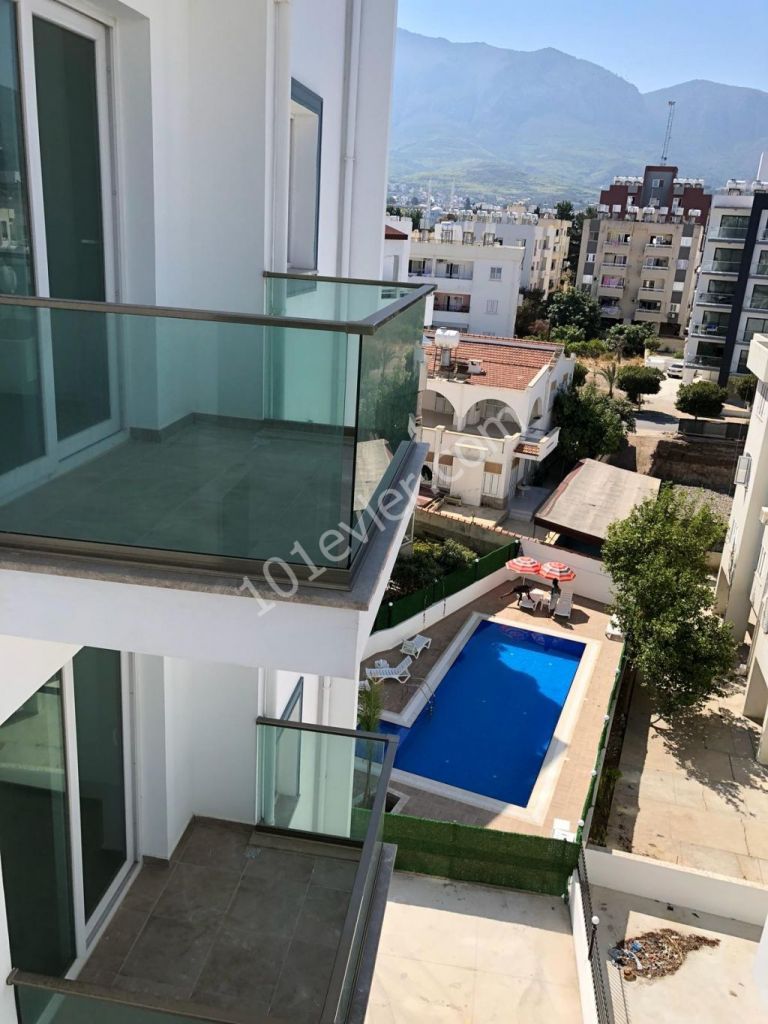 Ready to move! 2 Beds Modern Flat in Kyrenia Center With Communal Pool, Security and Underground Parking