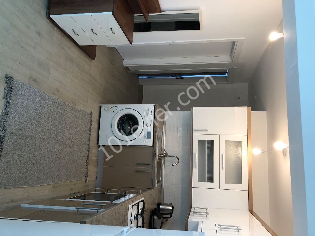 Ready to move! 2 Beds Modern Flat in Kyrenia Center With Communal Pool, Security and Underground Parking