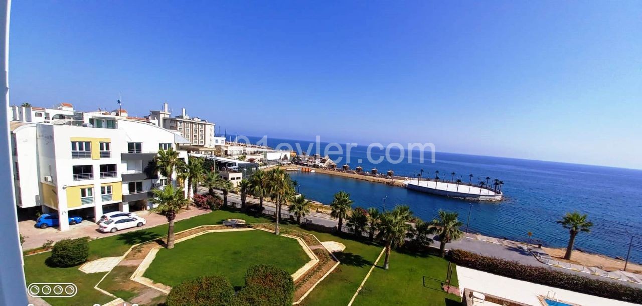 4-Bedroom furnished penthouse on the beachfront site with the most beautiful pool in Kyrenia is for sale 05338334049 for detailed information and on-site viewing ** 