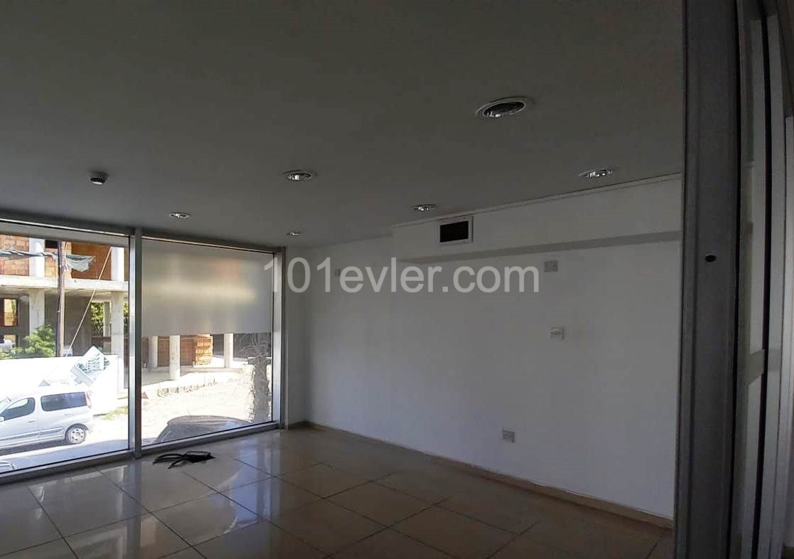 COMPLETE BUILDING SUITABLE FOR A BANK AND FINANCE OFFICE AND STORE ON THE STREET IN THE CENTER OF KYRENIA. ** 