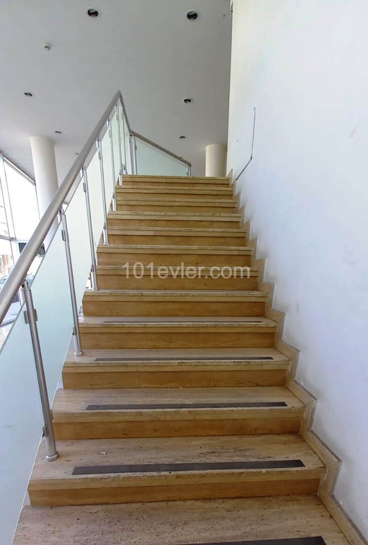 COMPLETE BUILDING SUITABLE FOR A BANK AND FINANCE OFFICE AND STORE ON THE STREET IN THE CENTER OF KYRENIA. ** 