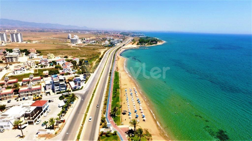 Beautiful sandy beach is right next to the property for sale in North Cyprus. please contuct us. Whats App:05338334049 **  ** 