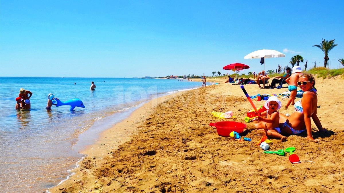 Beautiful sandy beach right next to the property for sale in  North Cyprus. please contuct us. Whats App:05338334049