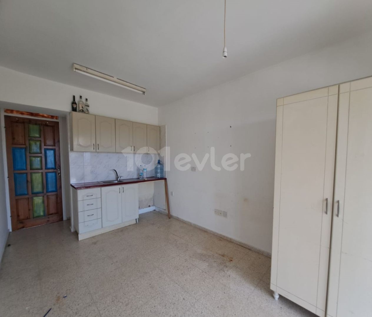 On Çatalkoy-Ozankoy main road. Unfurnished single room.