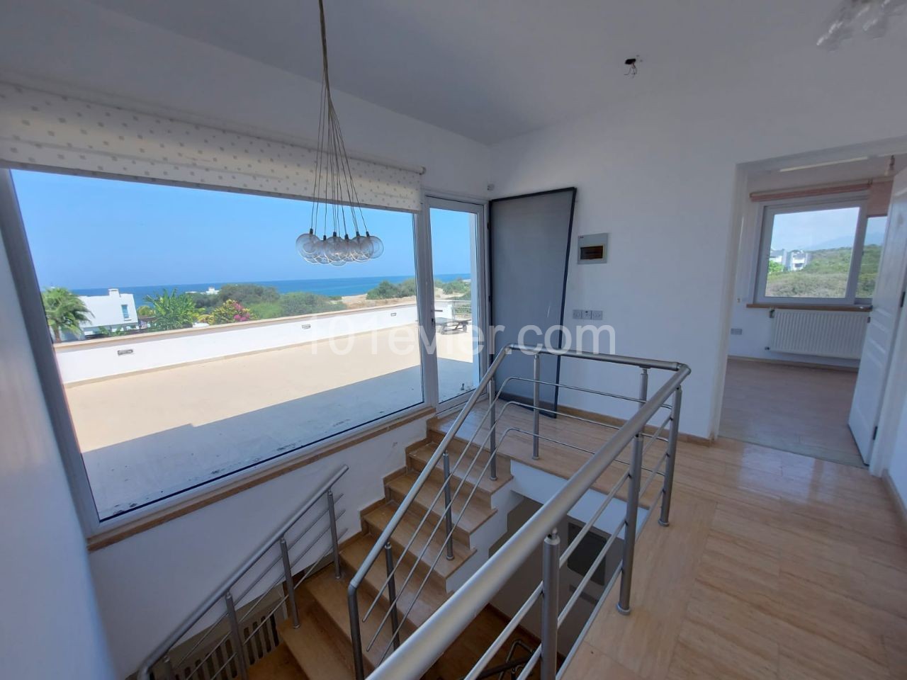 DETACHED Triplex villa with private swimming pool FOR SALE in Çatalköy, 100 meters from the beach. ** 