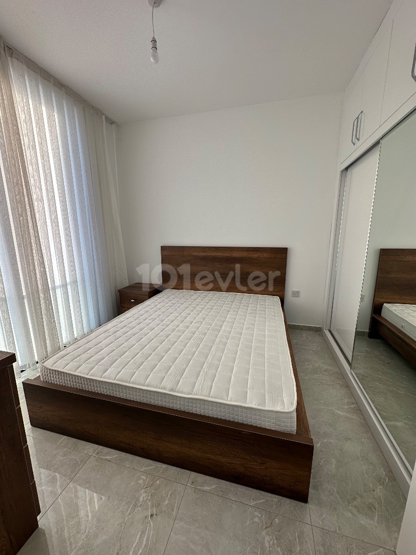 İskele Long beach de full lux eşyalı 2+1  sıfır kiralık daireler 