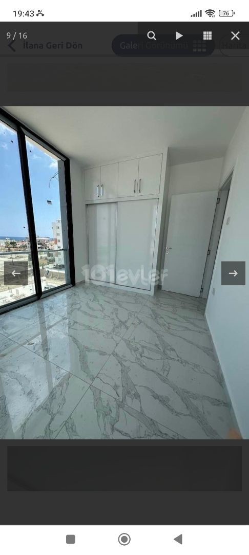 İskele long beach de siifr ,esyasiz ,kiralık 2+1 daire 