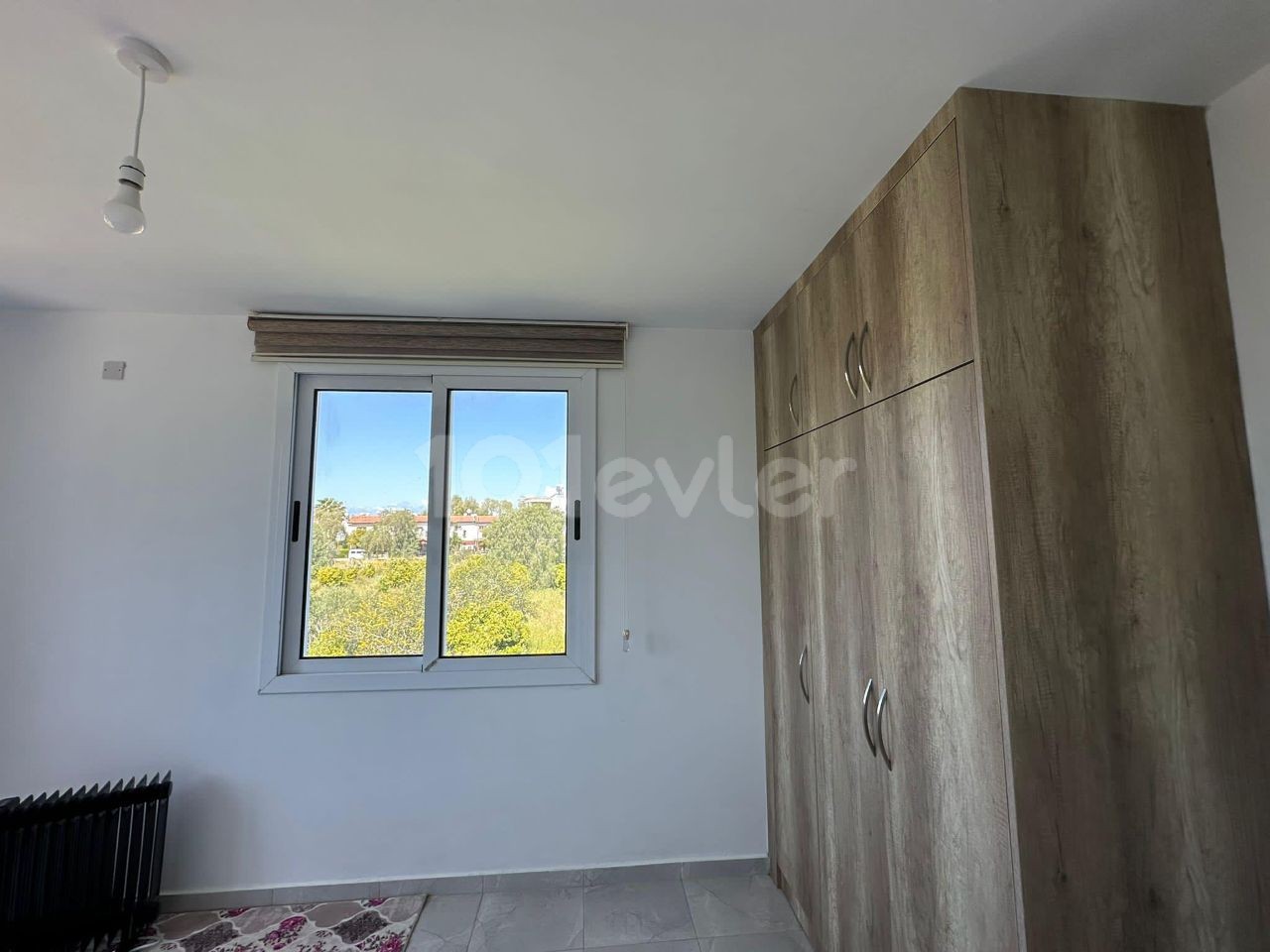 2+1 Apartments For Sale Next to Pizzavira in the Center of Güzelyurt Region 