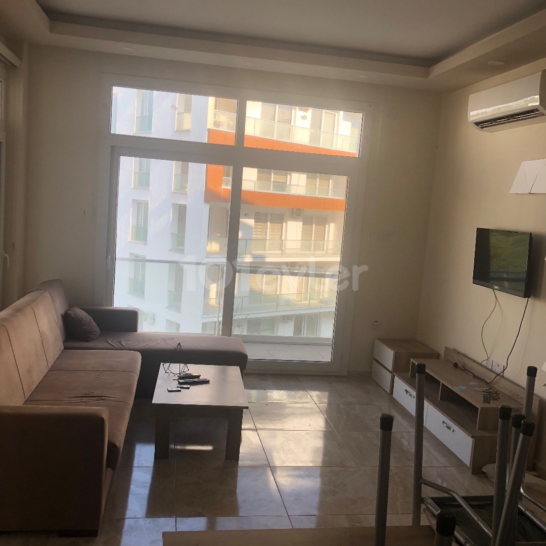 FULLY FURNISHED 1 + 1 APARTMENT FOR SALE IN WALKING DISTANCE FROM THE EUROPEAN UNIVERSITY OF LEFKE.. ** 