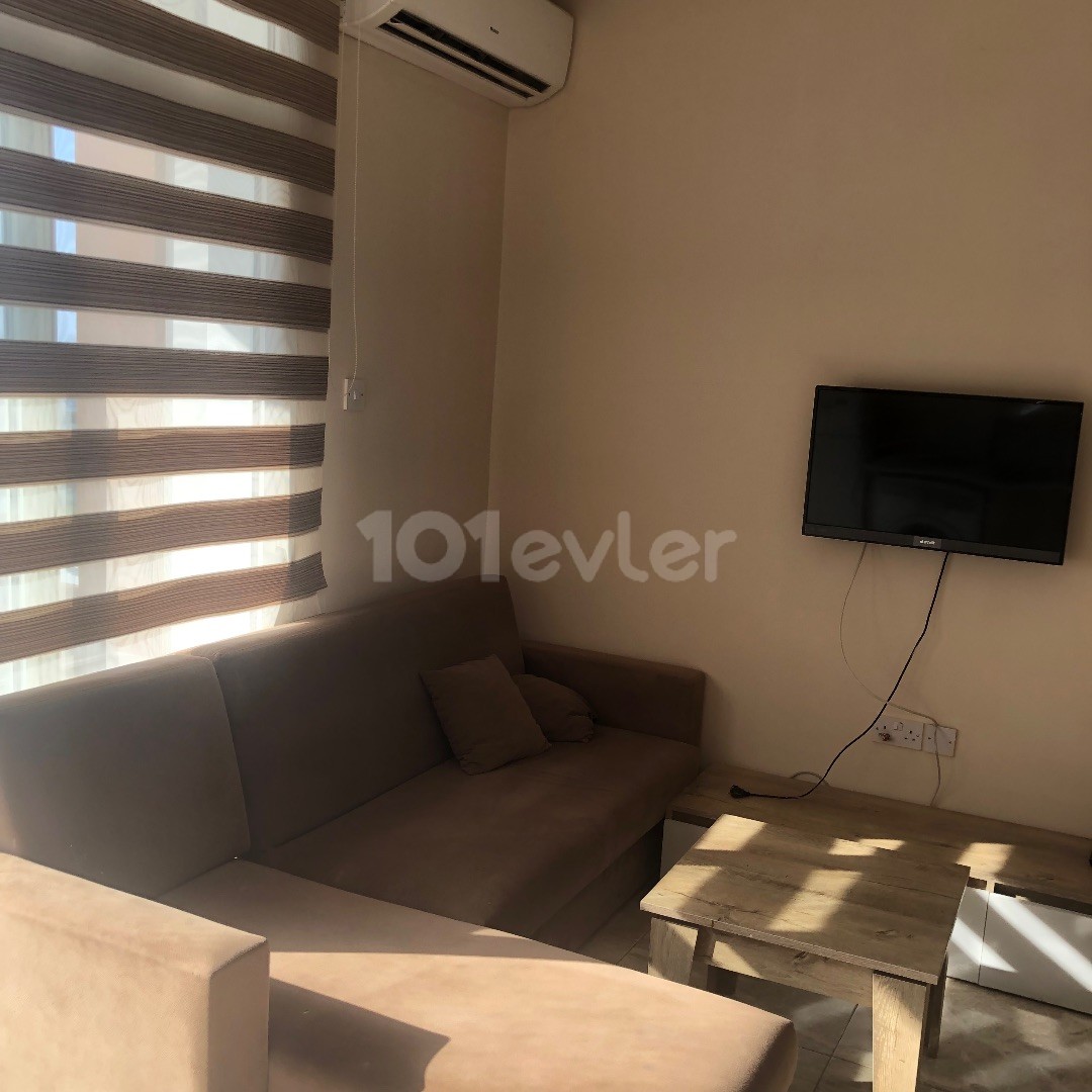 FULLY FURNISHED 2 + 1 APARTMENT FOR SALE IN WALKING DISTANCE FROM THE AMERICAN UNIVERSITY OF LEFKE.. ** 