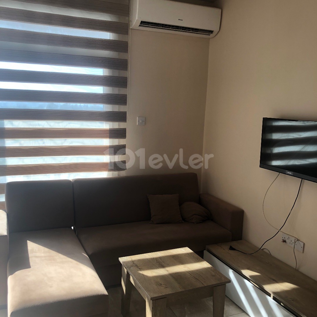 FULLY FURNISHED 2 + 1 APARTMENT FOR SALE IN WALKING DISTANCE FROM THE AMERICAN UNIVERSITY OF LEFKE.. ** 