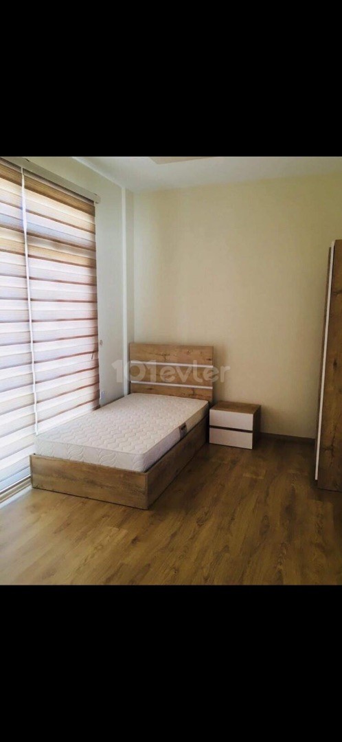 FULLY FURNISHED 2 + 1 APARTMENT FOR SALE IN WALKING DISTANCE FROM THE AMERICAN UNIVERSITY OF LEFKE.. ** 