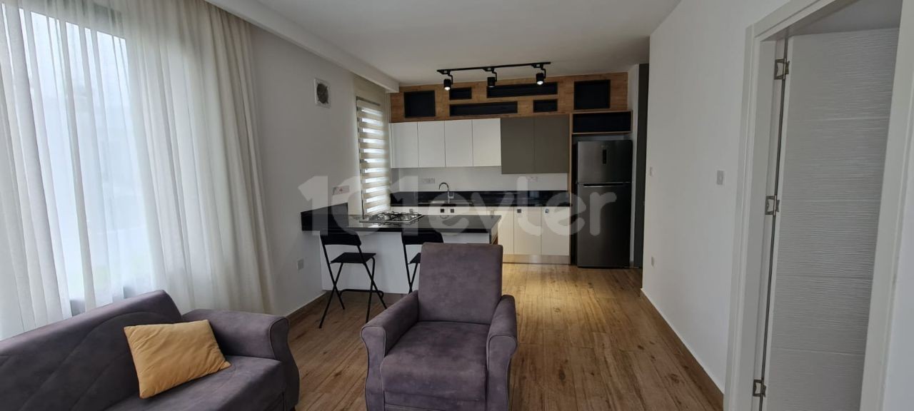 ✨✨✨✨THIS OPPORTUNITY AT THIS PRICE IS NOT TO BE MISSED✨✨✨✨GİRNE OZANKÖY REGION ON THE STREET ON THE STREET FOR THOSE WHO ARE LOOKING FOR PEACE AND COMFORT TOGETHER, LUXURY 1 + 1 APARTMENT WITH ELEVATOR WITH INDOOR PARKING ✔️ ﻿