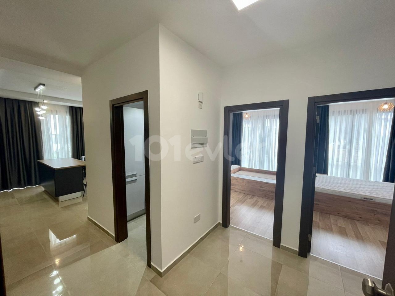 FOR THOSE LOOKING FOR A LOW FLOOR. .  FULLY FURNISHED LUXURIOUS 2+1 APARTMENT WITH ATTRACTIVE ADVANTAGES SUCH AS AIR CONDITIONING IN EVERY ROOM, LARGE SCREEN LCD TV, LAUNDRY ROOM, PARKING LOT, COMMUNAL POOL, WHICH EXHIBITS A UNIQUE BLUE AND GREEN VIEW TOGETHER, CLOSE TO THE CITY LIFE IN THE OLIVE GI