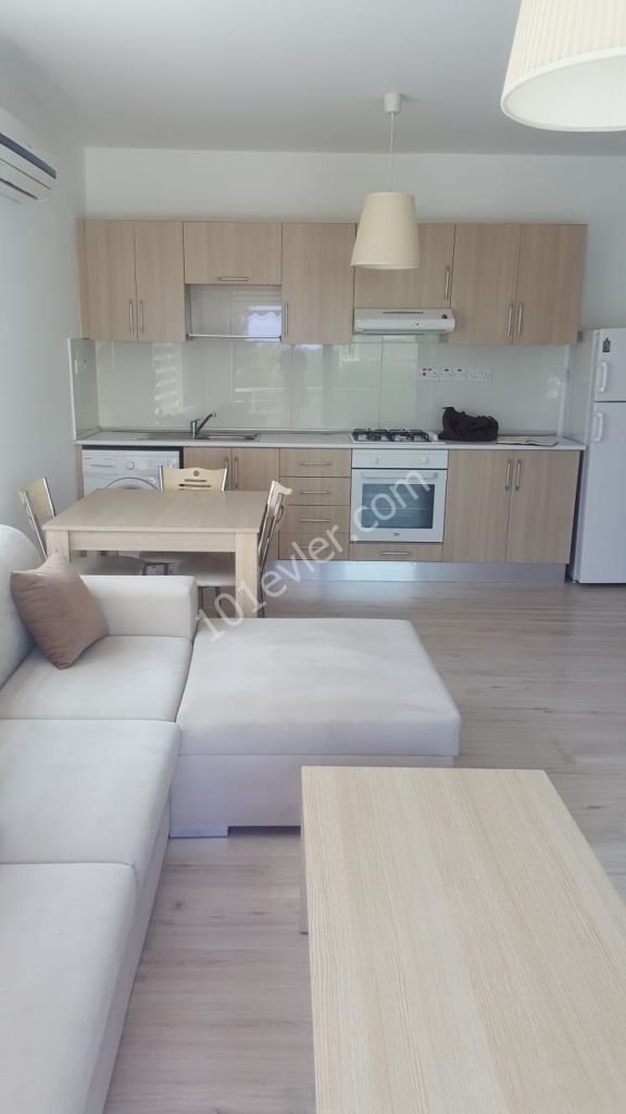 GİRNE  MERKEZDE  EŞYALI DENİZ MANZARALI 2+1 DAİRE