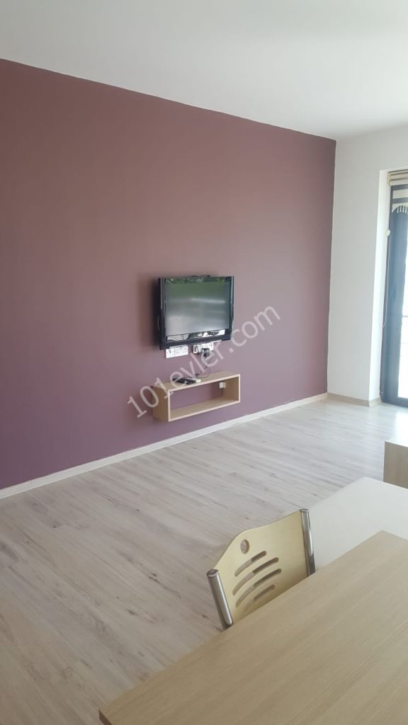 GİRNE  MERKEZDE  EŞYALI DENİZ MANZARALI 2+1 DAİRE