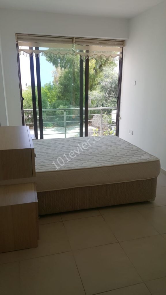 GİRNE  MERKEZDE  EŞYALI DENİZ MANZARALI 2+1 DAİRE