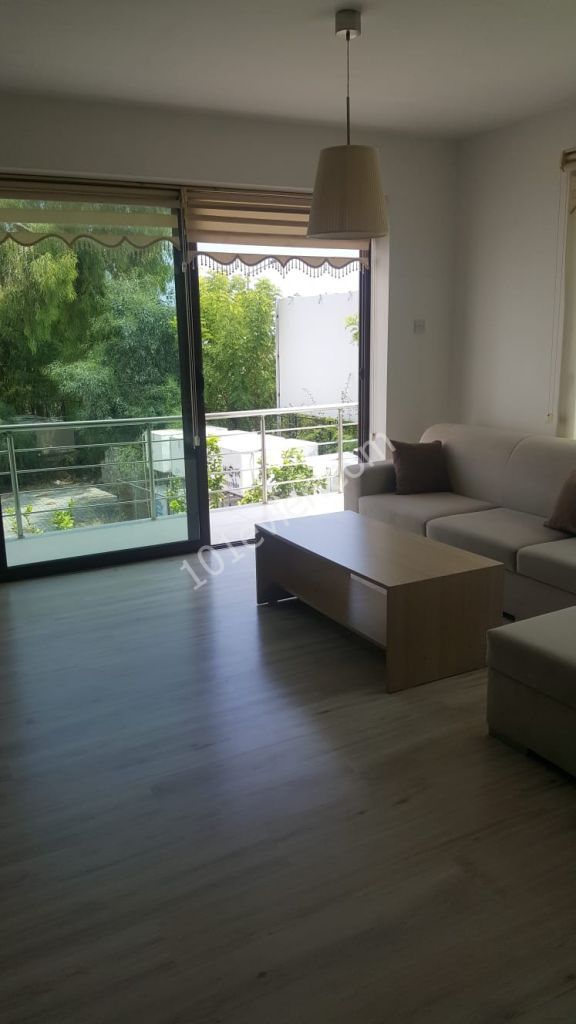 GİRNE  MERKEZDE  EŞYALI DENİZ MANZARALI 2+1 DAİRE