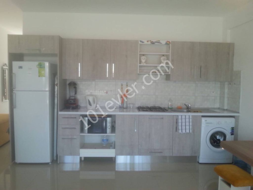 ALSANCAK'DA ORTAK HAVUZLU 1+1 SATILIK DAİRE