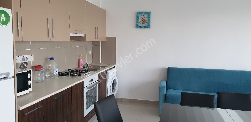 ALSANCAK'DA DAĞ MANZARALI ORTAK HAVUZLU 1+1 SATILIK DAİRE