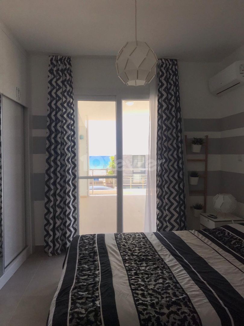 CAESAR BEACHTE IS A 2+1 FULLY FURNISHED GROUND FLOOR APARTMENT 20 METERS FROM THE SEA ** 