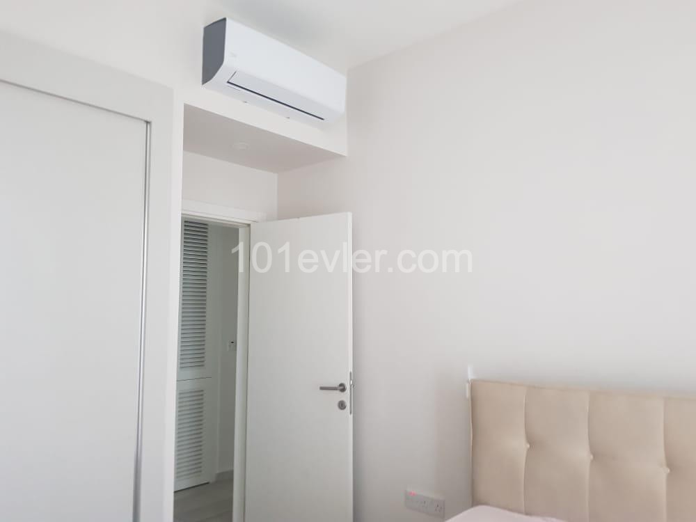 KIBRIS GİRNE ALSANCAK 2+1 KİRALIK DAİRE BAHÇELİ, ORTAK HAVUZLU VE GÜVENLİKLİ SİTEDE