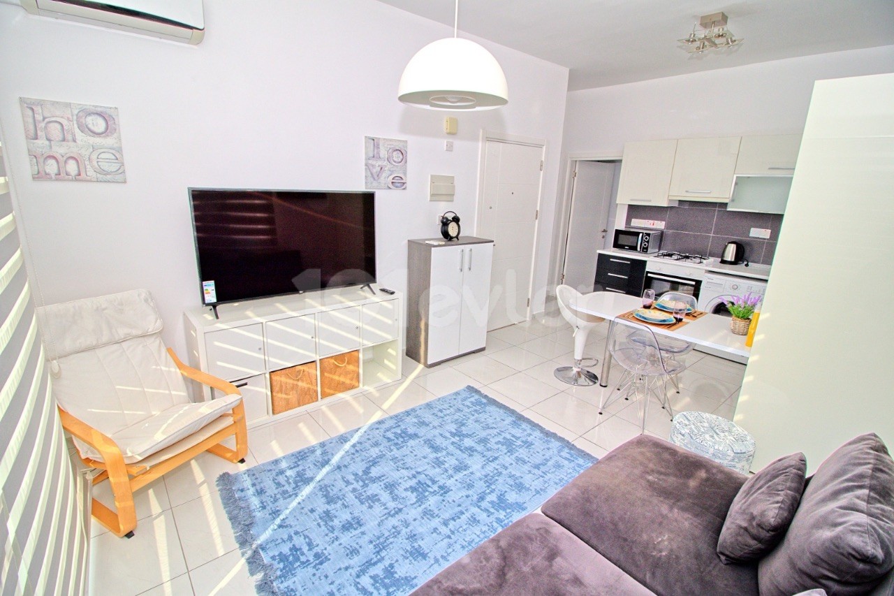 ALSANCAK ESCAPE HOMES SITE 1+1 FURNISHED APARTMENT FOR RENT, WITH SHARED POOL, CLOSE TO THE SEA ** 