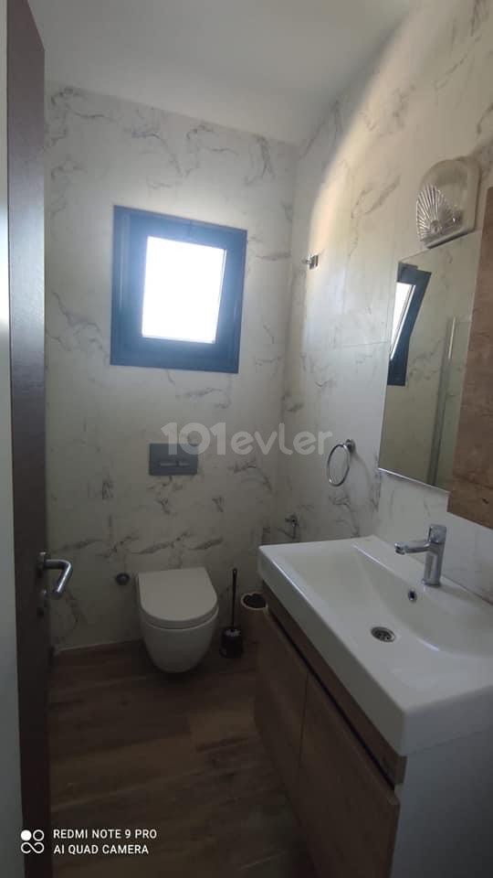 2+1 FLAT IN İSKELE LONG BEACH.