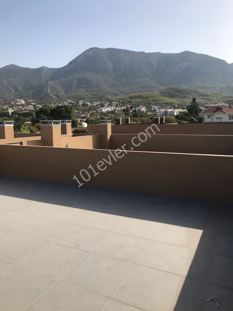 ZERO 2 +1 APARTMENT FOR SALE WITH MOUNTAIN AND SEA VIEWS WITH A TERRACE WITH A POOL 2 MINUTES FROM THE CENTER IN KYRENIA DOGANKOY.. ** 