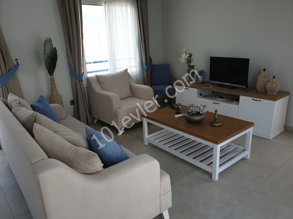 LUXURY APARTMENTS IN KYRENIA ESCAPE BEACH ON A SITE WITH A POOL AT PRICES STARTING FROM STG 58000 ** 