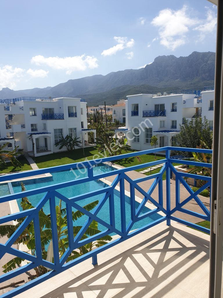 LUXURY APARTMENTS IN KYRENIA ESCAPE BEACH ON A SITE WITH A POOL AT PRICES STARTING FROM STG 58000 ** 