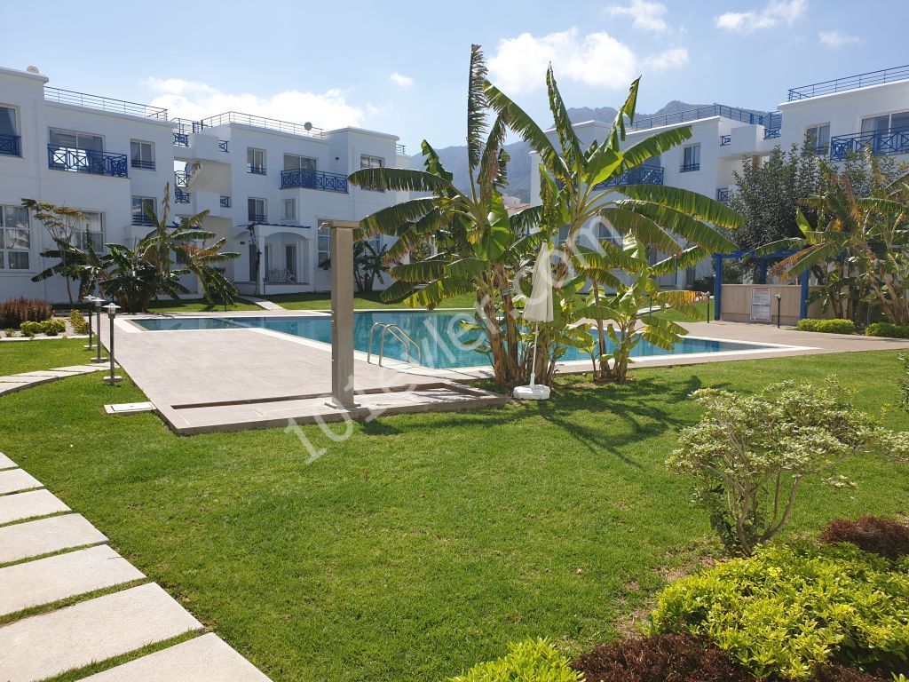 LUXURY APARTMENTS IN KYRENIA ESCAPE BEACH ON A SITE WITH A POOL AT PRICES STARTING FROM STG 58000 ** 