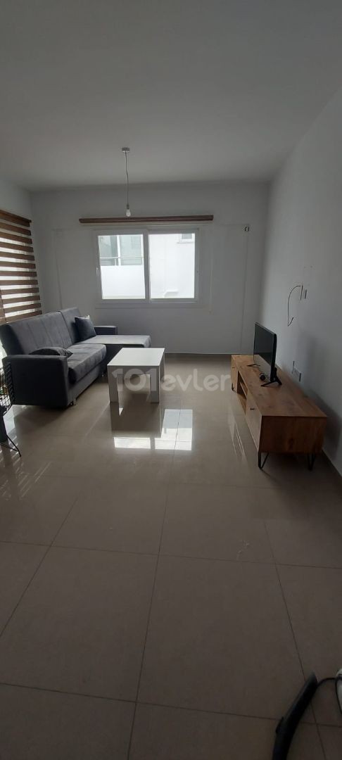 1 + 1 1 + 1 apartment with a tenant guaranteed location in the center of small kaymaklı is waiting for its new owner as furnished and tenant.  Whether as an investment or by staying yourself, you can be the owner of this apartment at an affordable price by making economy from time and fuel expense. 