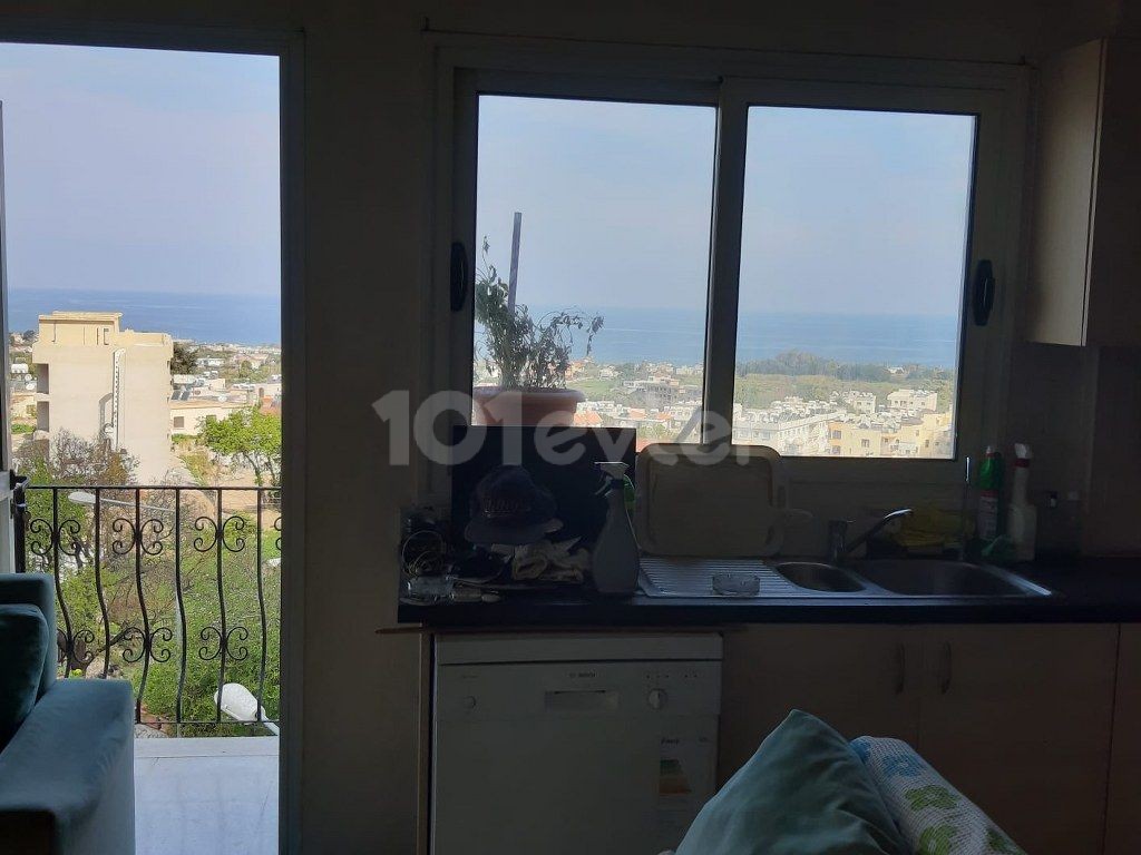 2 Bedroom Apartment For sale with Beautiful Sea and Mountains views Location Lapta Girne (Turkish Title Deeds) (Urgent Sale with very low Final prices) (Acil Satilik Kelepir Daire)