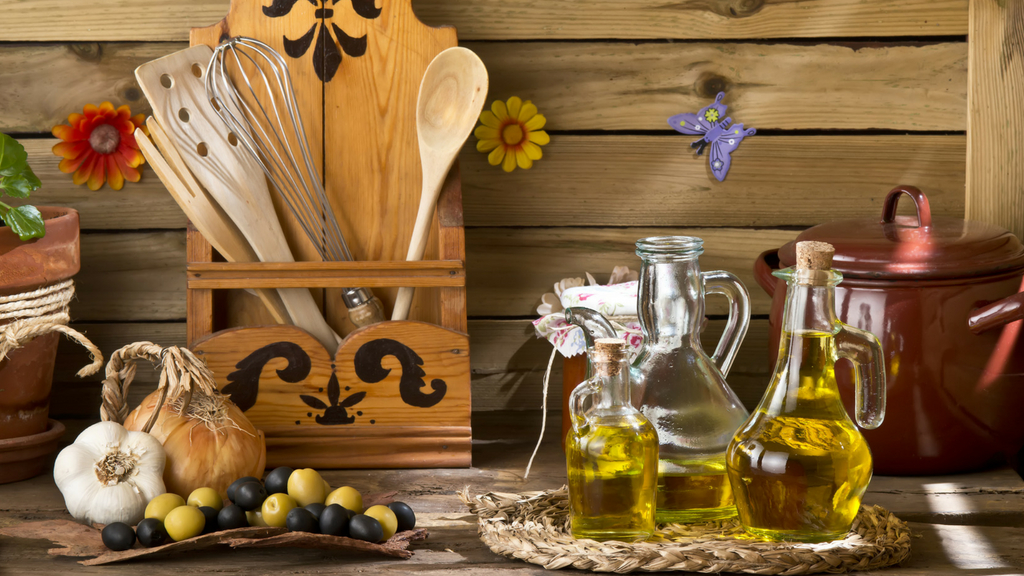 a table with a basket and a basket with food and a vase with flowers