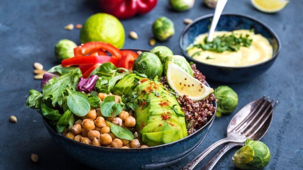 Colorful buddha bowl with quinoa and garbanzo beans