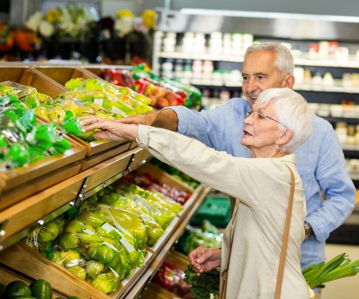 Senior couple shopping at the produce section